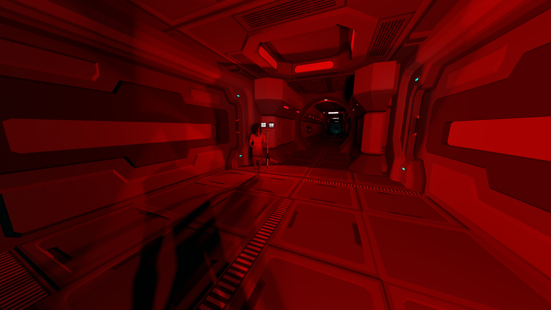 Low-poly corridor completely bathed in intense red emergency light; far down the geometric hallway a slender humanoid silhouette stands motionless beside a portable light stand, casting a long shadow toward the viewer.